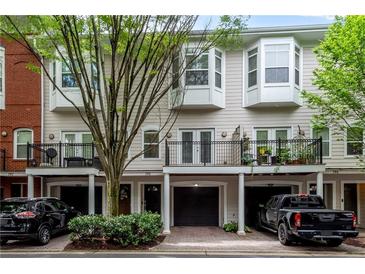Charming townhome featuring a private balcony and convenient attached garage at 793 Inman Mews Ne Dr, Atlanta, GA 30307