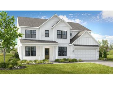 Beautiful new construction two-story home with white siding, black framed windows, and well-manicured front yard at 5415 Trescott Path, Cumming, GA 30028