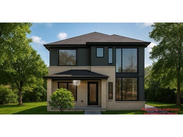 Modern two-story home featuring large windows and a well-manicured front lawn at 1111 Moreland Se Pl, Atlanta, GA 30316