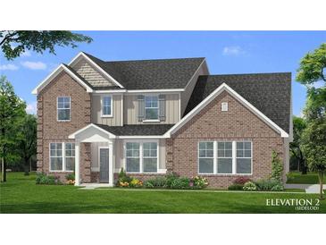 Charming two-story brick home with a beautifully landscaped front yard and covered entryway at 301 Moab Ct, Stockbridge, GA 30281