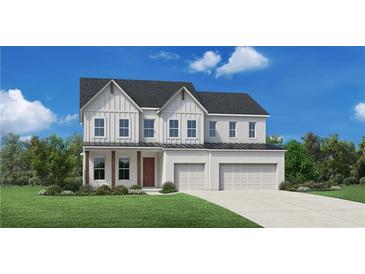 Charming two-story home with a brick facade, three-car garage, covered porch, and neatly manicured lawn at 7048 Foundry Dr, Woodstock, GA 30188