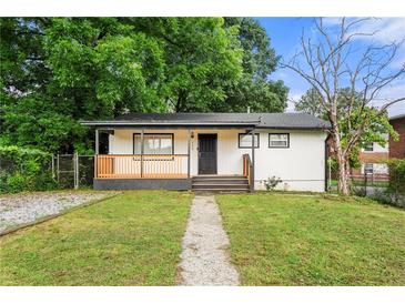 Charming single-story home featuring a welcoming front porch and well-maintained lawn at 132 Lamar Nw Ave, Atlanta, GA 30314