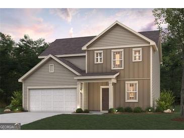Charming two-story home featuring a covered front entry, attached garage, and manicured lawn at 8503 Polston Lot 142 Pl, Douglasville, GA 30134