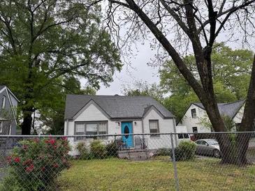 Charming home featuring a newly painted exterior and a delightful blue front door at 2620 Northview Ave, Decatur, GA 30032