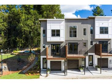 Modern townhome featuring a private balcony and attached garage in a desirable neighborhood at 2328 Mason Drive Dr, Atlanta, GA 30316