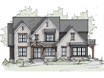 Charming two-story home featuring brick facade, gray roof, and a covered entryway with timber accents at 127 Palisade Dr, Rydal, GA 30171