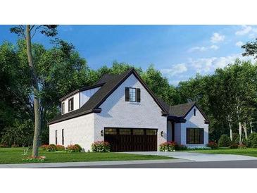 Charming new construction home with a two-car garage, black trim, and white painted brick at 1077 Crooked Creek Rd, Lithonia, GA 30058