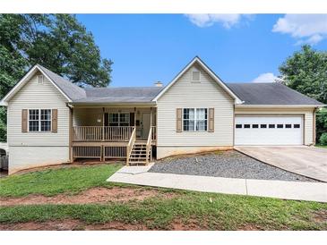 Charming one-story home with a manicured lawn and attached garage, providing comfort and convenience at 350 Dailey Mill Rd, Mcdonough, GA 30253