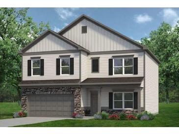 Two-story home with stone accents, black shutters, and a well-manicured lawn at 2 Silver Leaf Trl, Douglasville, GA 30134