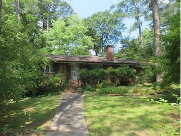 Charming brick ranch home with mature trees and lush landscaping provides privacy at 2448 Sherbrooke Ne Ct, Atlanta, GA 30345