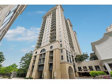 Stunning view of the high-rise building with attractive stone accents and private terraces overlooking the city at 3040 Peachtree Rd, Atlanta, GA 30305