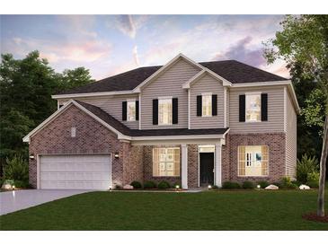 Charming two-story home featuring a brick and siding exterior, well-manicured lawn, and an attached two-car garage at 817 Dobby Way, Mcdonough, GA 30252