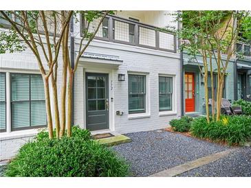 Charming two-story brick home with a well-manicured front yard and inviting entrance at 772 Aerial Se Way, Atlanta, GA 30312