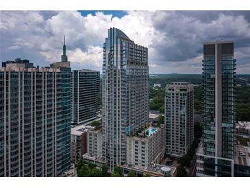 Stunning aerial view of high-rise luxury apartments with modern architectural design and breathtaking city views at 855 Peachtree Ne St # 3304, Atlanta, GA 30308