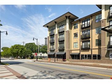 Modern apartment building showcasing architectural design and streetscape appeal at 5300 Peachtree Rd # 3207, Chamblee, GA 30341