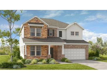Charming two-story home featuring brick and stone accents, a covered porch, and an attached two-car garage at 4034 Dantry Ln, Buford, GA 30519