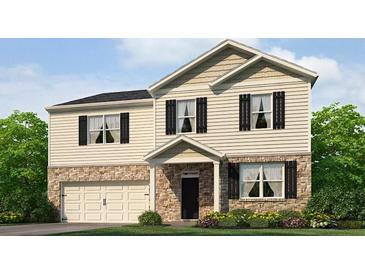 Charming two-story home featuring stone accents, a two-car garage, and a well-manicured lawn at 116 Crooked Lake Park, Villa Rica, GA 30180