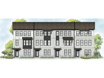 New townhome construction with white brick facade, dark window frames, and a symmetrical design at 402 Nix Ln, Lawrenceville, GA 30046