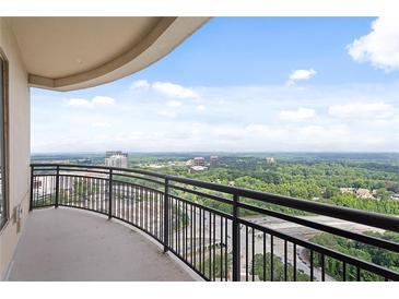 Relaxing balcony with sprawling city views and blue skies at 3445 Stratford Ne Rd # 3403, Atlanta, GA 30326