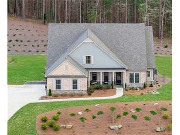 Charming single-Gathering home with well-manicured lawn and attractive brick and siding exterior at 174 Vandiver Ct, Acworth, GA 30101