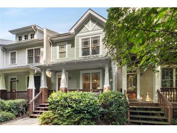 Charming townhome with a welcoming front porch, perfect for enjoying the outdoors at 106 Oakhurst Ter, Decatur, GA 30030