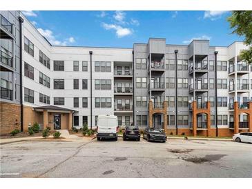 Modern building with multiple units, each featuring private balconies and convenient parking at 898 Oak Sw St # 3228, Atlanta, GA 30310