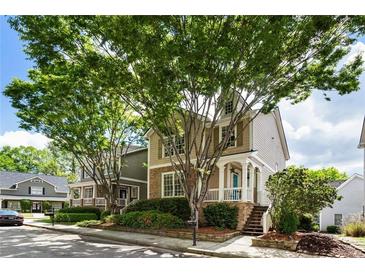Charming two-story home with inviting front porch and mature trees in a friendly neighborhood at 2238 Parkview Nw Ct, Atlanta, GA 30318