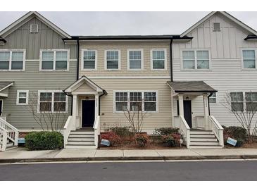 Well maintained townhouse with a front yard at 2163 Wiggins Walk, Atlanta, GA 30316