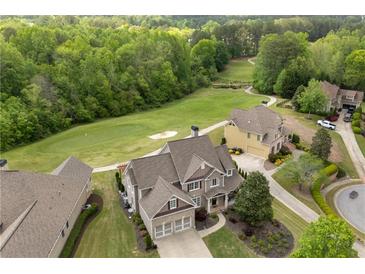 Gorgeous home with mature landscaping and golf course views in a desirable neighborhood at 44 Kingsford Xing, Acworth, GA 30101