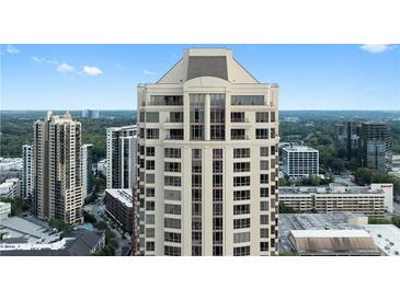 An impressive exterior view of a high-rise building with stunning architecture and large windows at 3475 Oak Valley Ne Rd # 2820, Atlanta, GA 30326