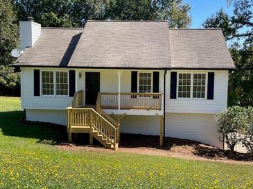 Charming one-story home with a new front porch, fresh paint, and landscaped front yard at 44 Fawn Trl, Hiram, GA 30141