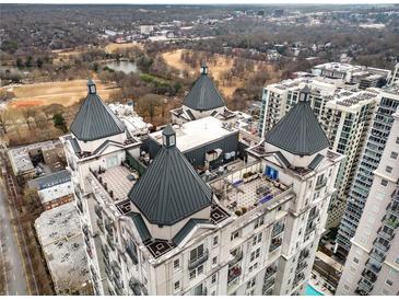 Luxury condo aerial view showcasing rooftop terraces and panoramic city views at 199 14Th Street Ne St # 704, Atlanta, GA 30309