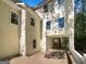 Back of house featuring a deck, patio, and multiple windows, enhancing natural light at 819 Bermuda Run, Woodstock, GA 30189