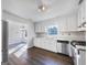 Bright kitchen with stainless steel appliances and ample counter space at 225 Woodfield Ct, Mcdonough, GA 30253