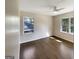 Spacious bedroom featuring hardwood floors and large windows at 1288 Fairhill Ne Ln, Brookhaven, GA 30319