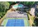 Community tennis court and pool; wooded setting at 4281 Horder Ct, Snellville, GA 30039