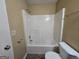 Bathroom with shower/tub combo and tile floor at 883 Pine Shoals Dr, Atlanta, GA 30349
