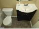 Small bathroom with single vanity and toilet at 883 Pine Shoals Dr, Atlanta, GA 30349