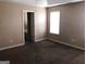 Main bedroom with bathroom access at 883 Pine Shoals Dr, Atlanta, GA 30349