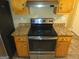 Stainless steel appliances and granite countertops highlight this kitchen at 883 Pine Shoals Dr, Atlanta, GA 30349