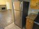 Stainless steel refrigerator in the kitchen at 883 Pine Shoals Dr, Atlanta, GA 30349