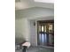 Inviting entryway with a view into the living area with hardwood floors and neutral decor at 3705 Sandhill Se Dr, Conyers, GA 30094