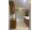 Kitchen with tile floors, a center island, and plenty of natural light at 3705 Sandhill Se Dr, Conyers, GA 30094