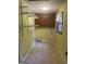 Functional laundry room with upper cabinets and tile flooring at 3705 Sandhill Se Dr, Conyers, GA 30094