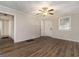 Open-concept living room with hardwood floors flowing into the kitchen, perfect for entertaining guests at 2576 Godfrey Nw Dr, Atlanta, GA 30318