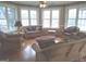 Inviting sunroom with wicker furniture, large windows for natural light, and floral wallpaper at 0 Hawkins Academy Rd, Social Circle, GA 30025