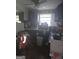 Functional kitchen with dark cabinetry and a window, ready for updates at 212 Little St, Atlanta, GA 30315