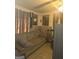 Cozy living room with a comfortable sofa, speakers, and wall paneling at 212 Little St, Atlanta, GA 30315