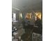 Inviting room featuring a comfortable couch, mirror, and a fan for relaxation at 212 Little St, Atlanta, GA 30315