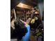 Cluttered storage room with washer, shelving, and miscellaneous items at 212 Little St, Atlanta, GA 30315